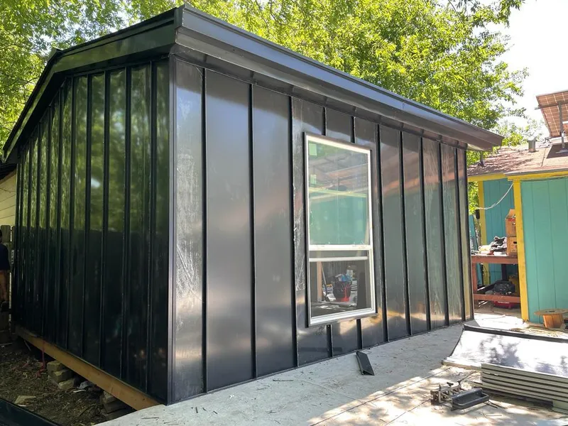 Black standing seam metal wall panels for Metal Roof Installation in Epsom