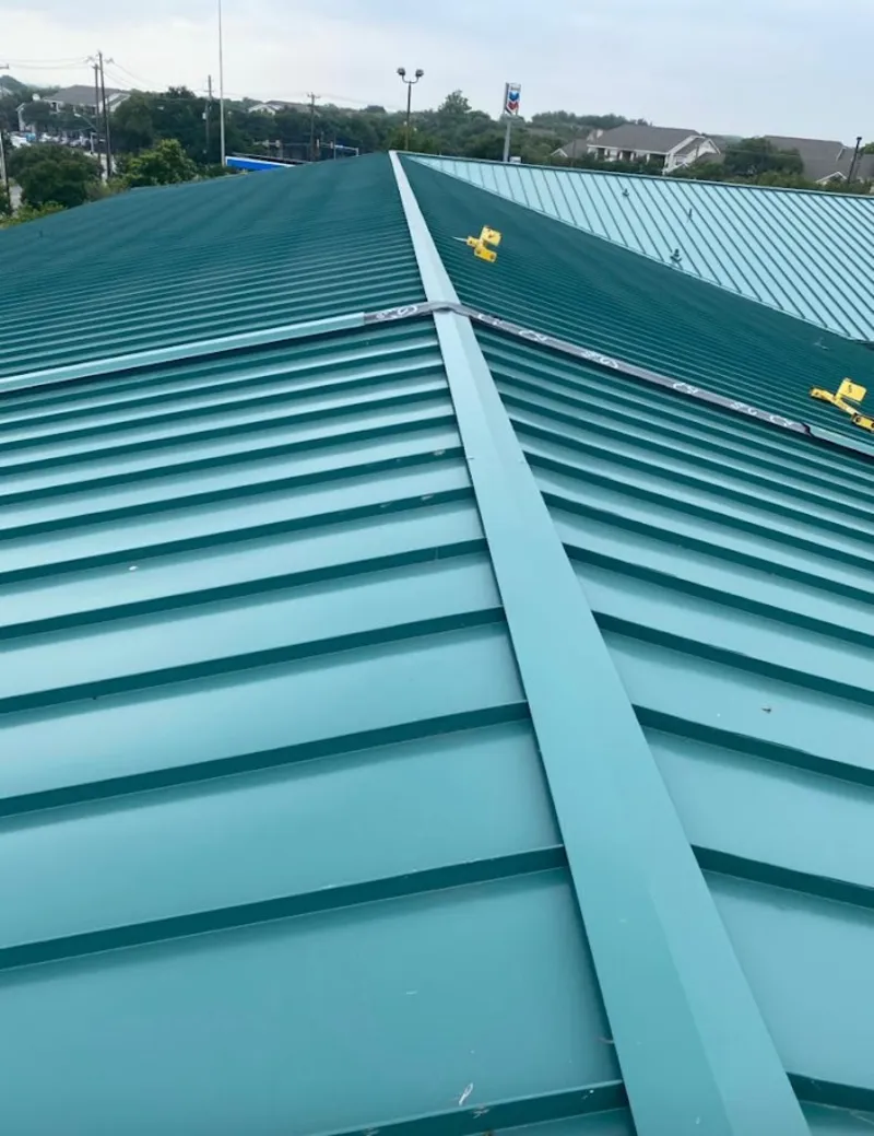 Green commercial metal roof ridge and valley for Metal Roof Repair in Epsom